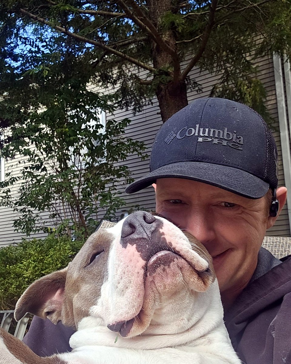 Matthew M. Clemens, Vice President and Treasurer, holding Lucy